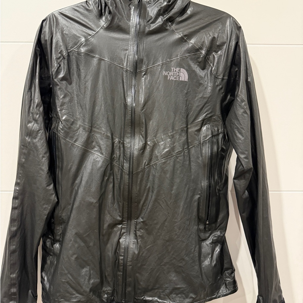 Black north face rain jacket size medium hardly worn